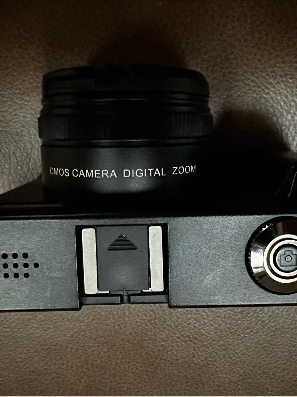 Compact Black Digital Camera with USB Cable and Lens Cap